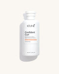Keune Confident Curl Conditioner product pack shot on Bijou cream background