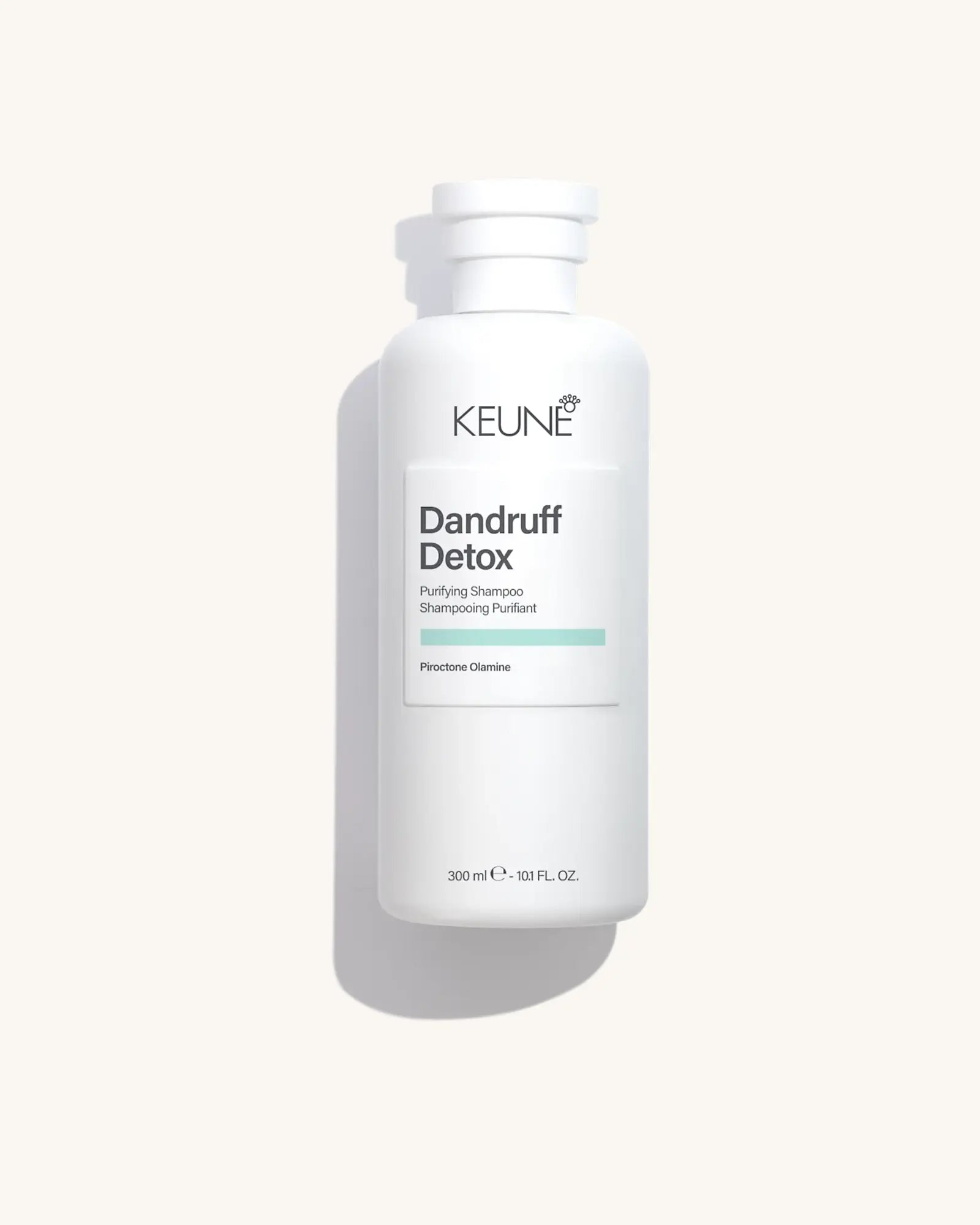 Keune Dandruff Detox Shampoo product pack shot on Bijou cream background