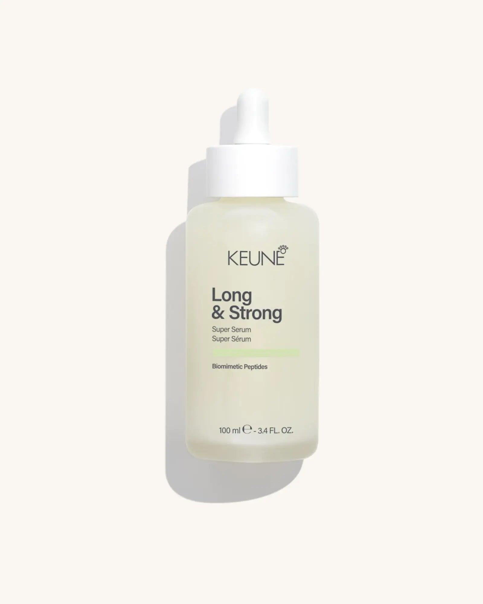 Keune Long & Strong Serum product pack shot on Bijou cream background