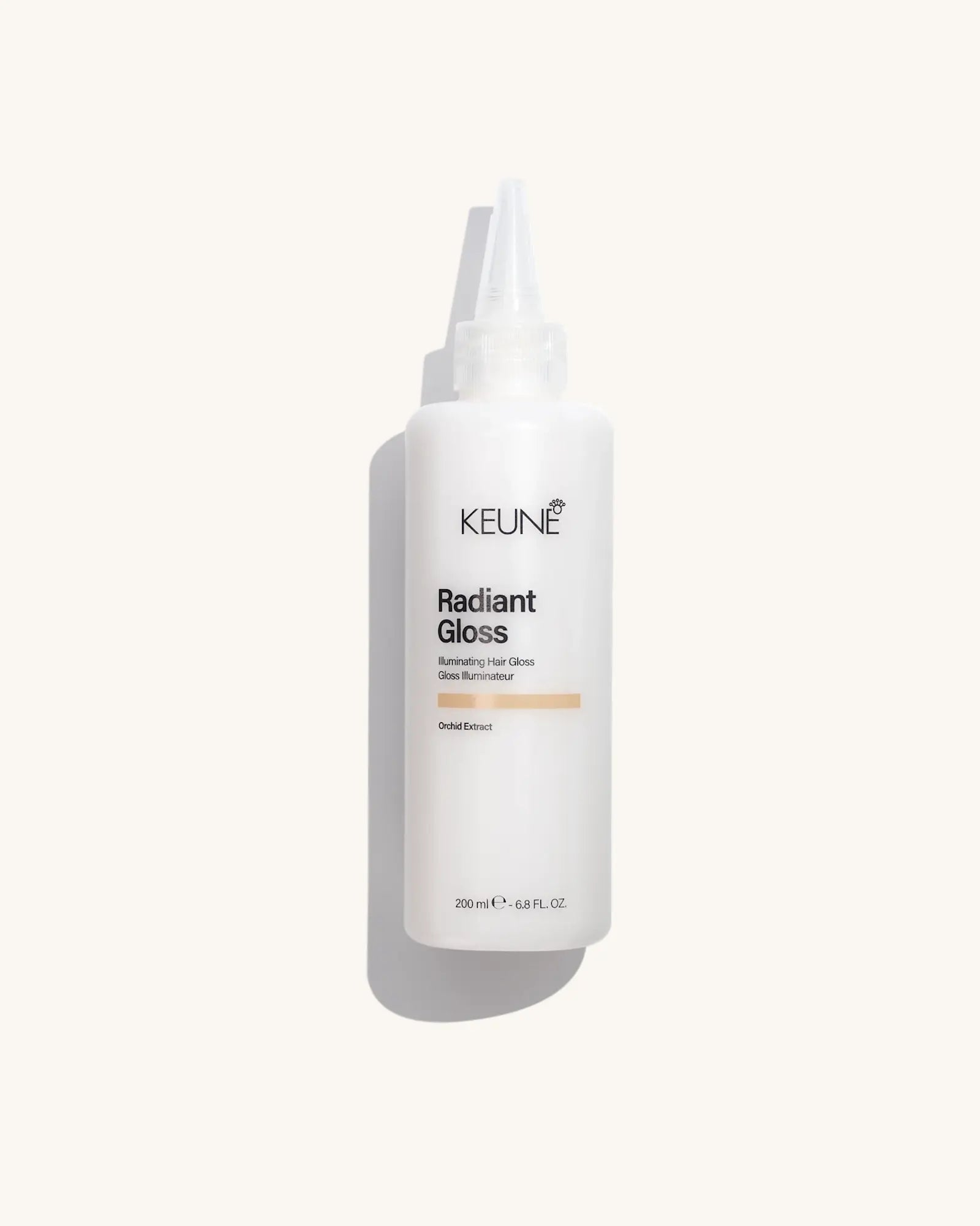 Keune Radiant Gloss Hair Gloss product pack shot on Bijou cream background