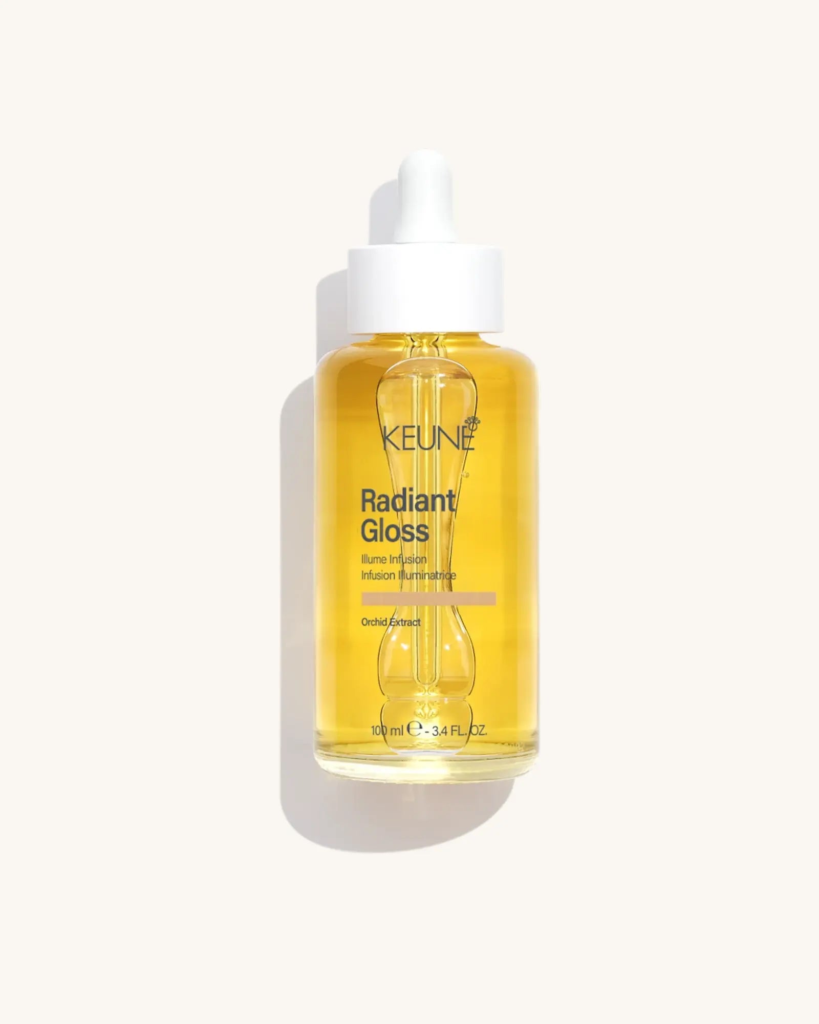Keune Radiant Gloss Illume Infusion product pack shot on Bijou cream background